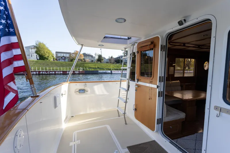 Basecamp Yacht Photos Pics Aft deck and exterior ladder to flybridge