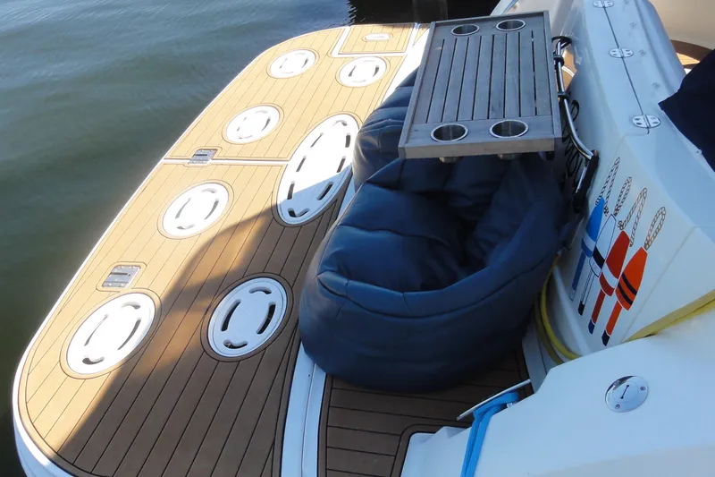  Yacht Photos Pics 2007 Sea Ray 36 Sedan Bridge swim platform with bean bag and table.