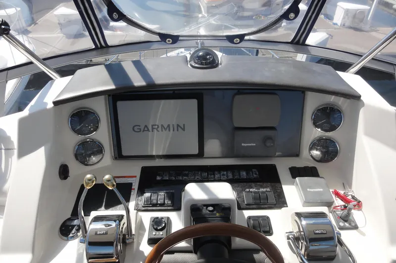  Yacht Photos Pics 2007 Sea Ray 36 Sedan Bridge helm with Garmin navigation system and controls.