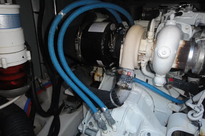  Yacht Photos Pics Engine compartment of a 2007 Sea Ray 36 Sedan Bridge with visible hoses and components.
