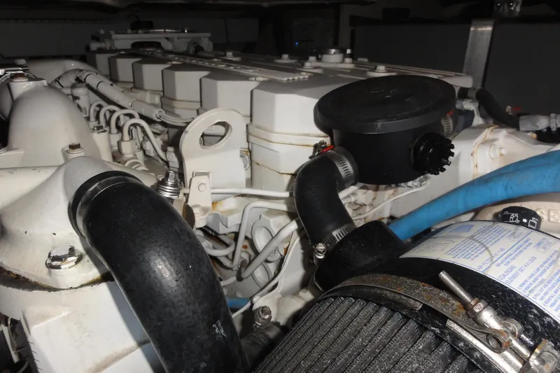  Yacht Photos Pics Engine compartment of a 2007 Sea Ray 36 Sedan Bridge, showcasing hoses and components.