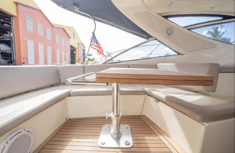 Parea Yacht Photos Pics Interior of 2011 Azimut Atlantis 40 yacht with seating and table.