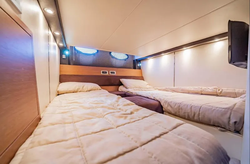 Parea Yacht Photos Pics Luxurious cabin interior of 2011 Azimut Atlantis 40 yacht with twin beds.