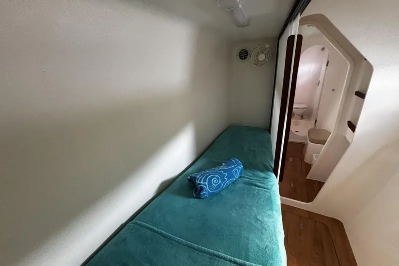 Windborne Yacht Photos Pics Single berth with lighting, fan, and AC
