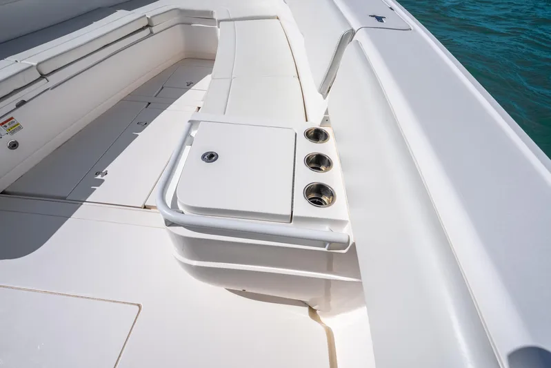  Yacht Photos Pics 2016 Intrepid 400 Center Console boat interior with seating and cup holders.