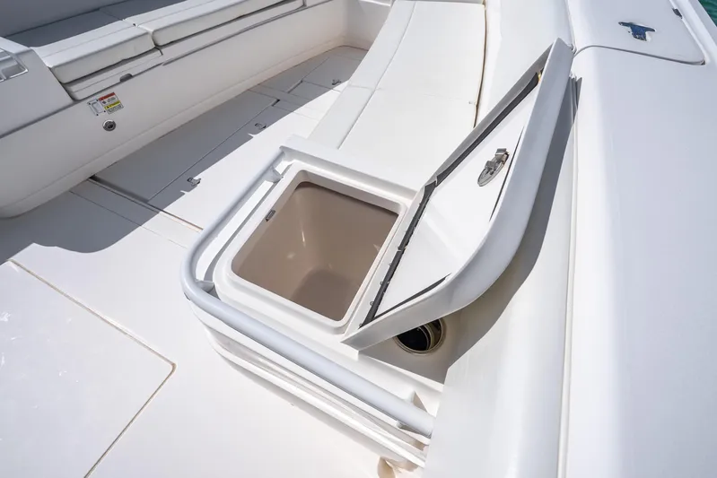  Yacht Photos Pics 2016 Intrepid 400 Center Console boat interior with open storage compartment.