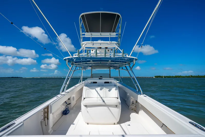  Yacht Photos Pics 2016 Intrepid 400 Center Console boat on open water under clear blue sky.