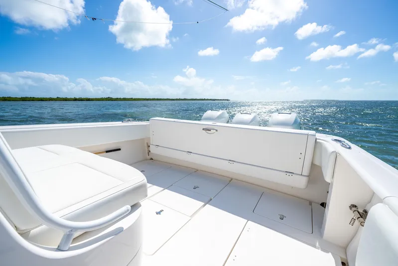  Yacht Photos Pics 2016 Intrepid 400 Center Console boat on open water under a sunny sky.