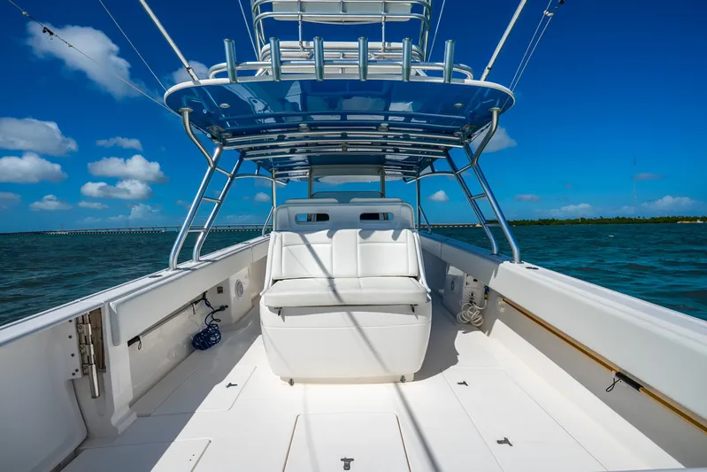  Yacht Photos Pics 2016 Intrepid 400 Center Console boat on open water under clear blue sky.
