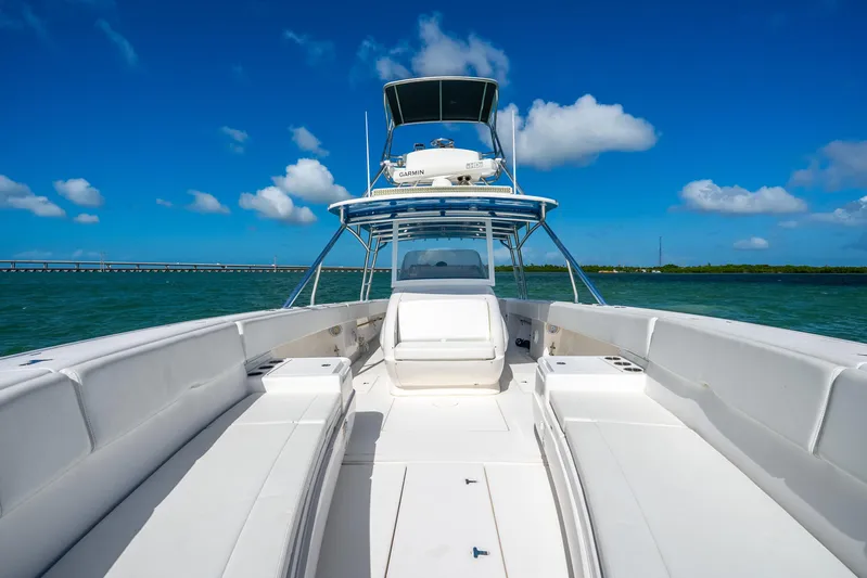  Yacht Photos Pics 2016 Intrepid 400 Center Console boat on clear blue water under a sunny sky.