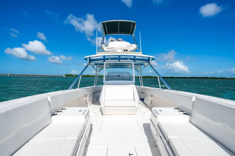  Yacht Photos Pics 2016 Intrepid 400 Center Console boat on open water under clear blue sky.
