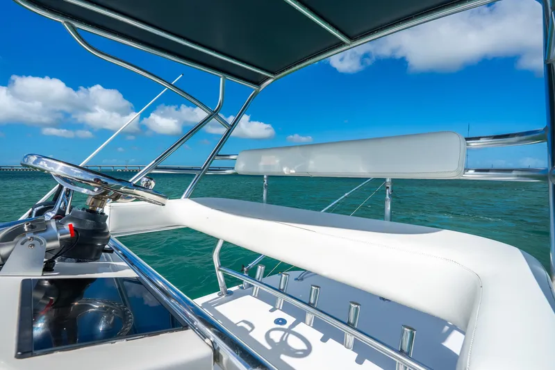  Yacht Photos Pics 2016 Intrepid 400 Center Console boat helm with ocean view and blue sky.