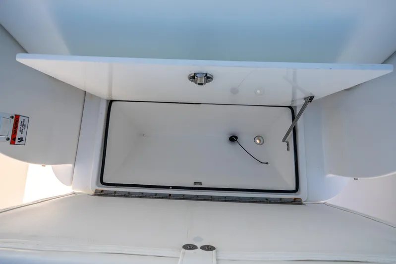  Yacht Photos Pics Open storage compartment on 2016 Intrepid 400 Center Console boat.