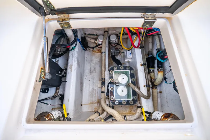  Yacht Photos Pics 2016 Intrepid 400 Center Console engine compartment with visible wiring and components.