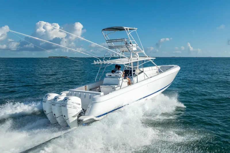  Yacht Photos Pics 2016 Intrepid 400 Center Console boat cruising on open water.