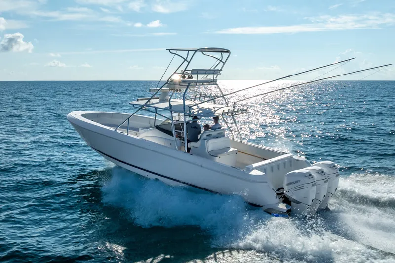  Yacht Photos Pics 2016 Intrepid 400 Center Console boat cruising on open ocean waters.