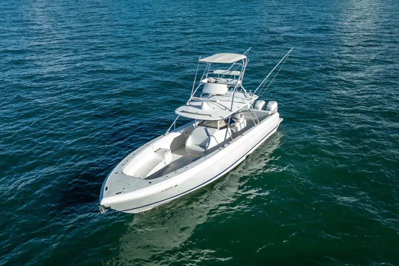  Yacht Photos Pics 2016 Intrepid 400 Center Console boat on open water, showcasing sleek design and powerful engines.