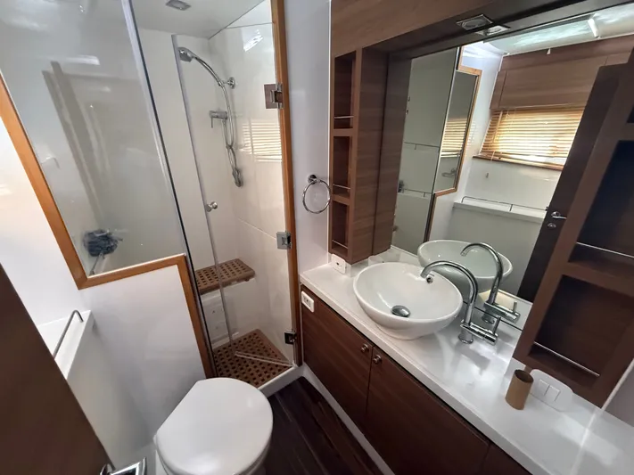  Yacht Photos Pics Luxurious bathroom of the 2024 Aquila 44 Yacht with modern amenities.