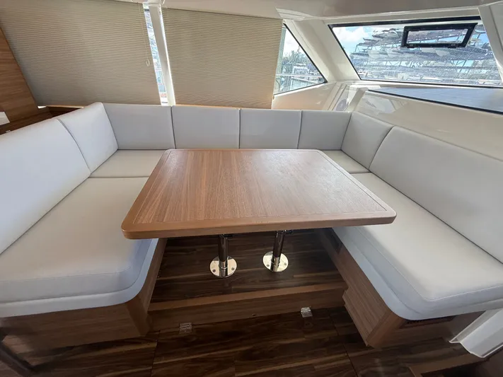  Yacht Photos Pics Interior of 2024 Aquila 44 Yacht featuring elegant seating area.