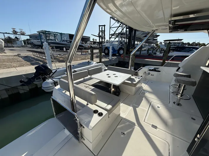  Yacht Photos Pics Aquila 44 Yacht 2024 with modern deck design at the marina.