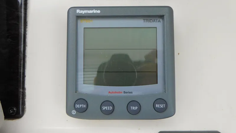  Yacht Photos Pics Raymarine Tridata display on 2007 Sea Ray 36 Sedan Bridge, showing depth, speed, and trip functions.