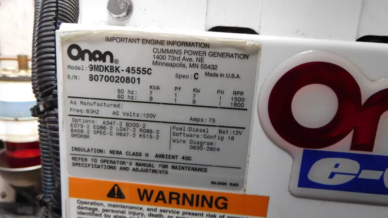  Yacht Photos Pics Onan generator label on 2007 Sea Ray 36 Sedan Bridge, model 9MDKBK-4555C.