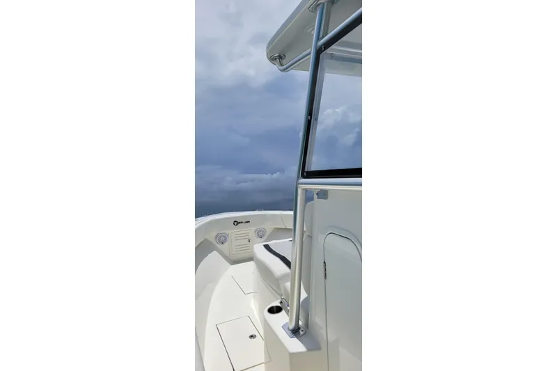  Yacht Photos Pics 2021 Sea-Lion 27 CC boat deck with cloudy sky background.