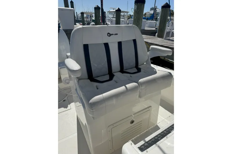  Yacht Photos Pics Captain's seat on 2021 Sea-Lion 27 CC boat at marina.