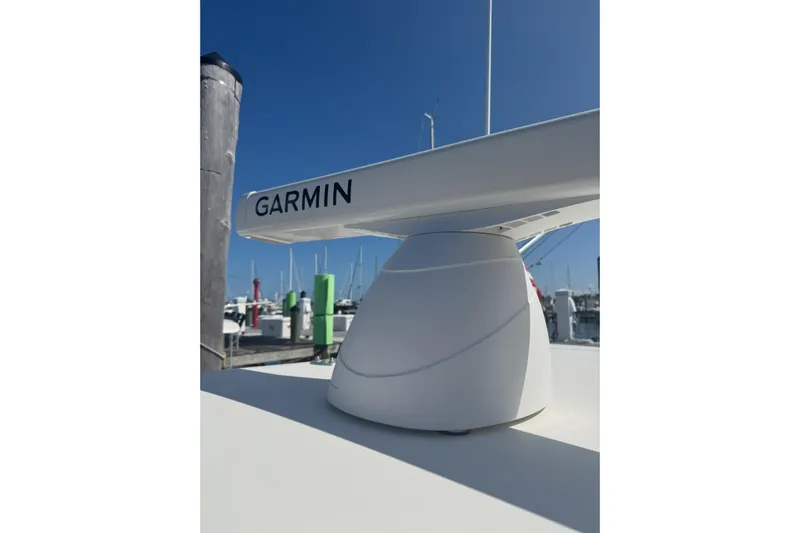  Yacht Photos Pics Garmin radar on 2021 Sea-Lion 27 CC boat, docked under clear blue sky.