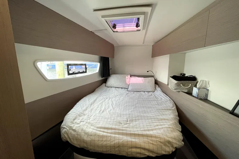 No Brainer Yacht Photos Pics Interior cabin of 2022 Fountaine Pajot Astrea 42 with cozy bed and modern design.