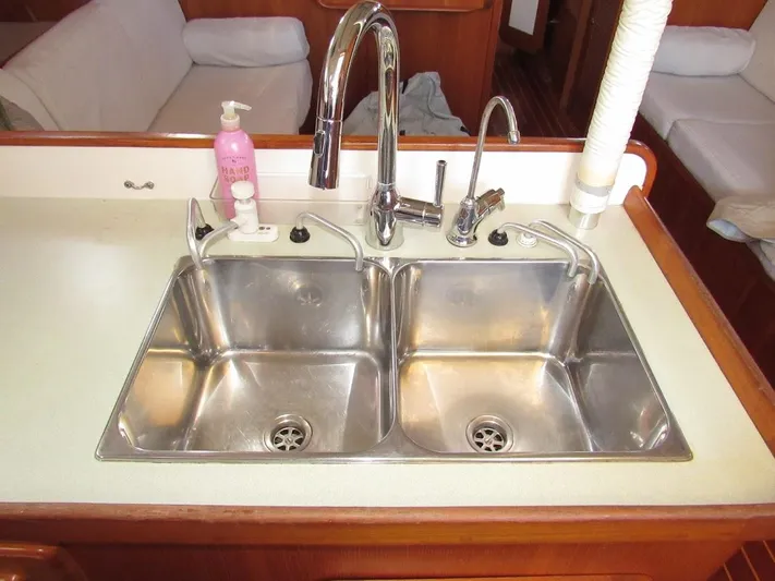 Via Yacht Photos Pics Double stainless steel sink in 2004 Caliber 40 LRC SE yacht kitchen.