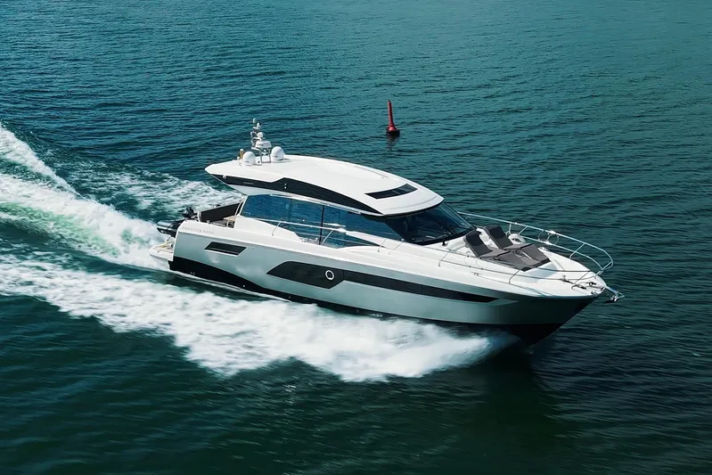 Prestige 520s Yacht Photos Pics 2018 Prestige 520S yacht cruising on open water, showcasing sleek design and luxury.