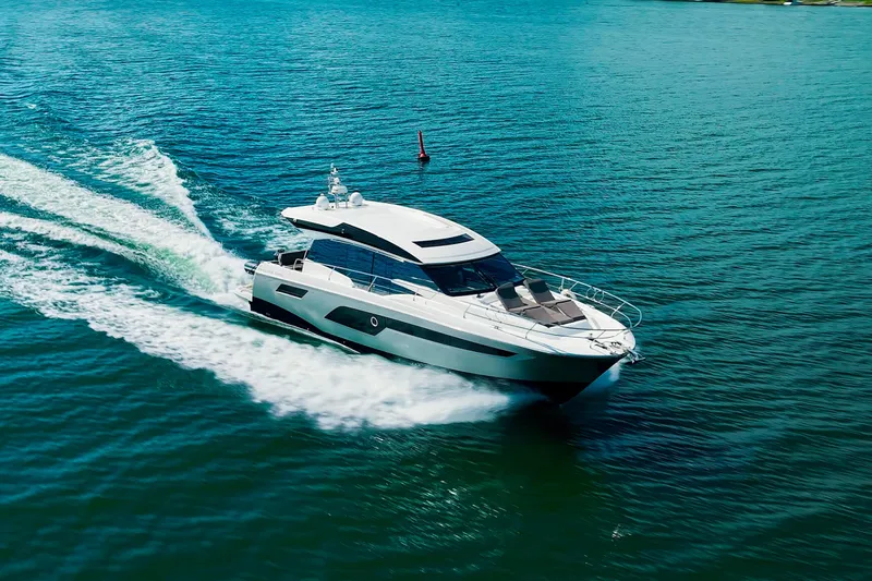 Prestige 520s Yacht Photos Pics 2018 Prestige 520S yacht cruising on open water, showcasing sleek design and luxury.