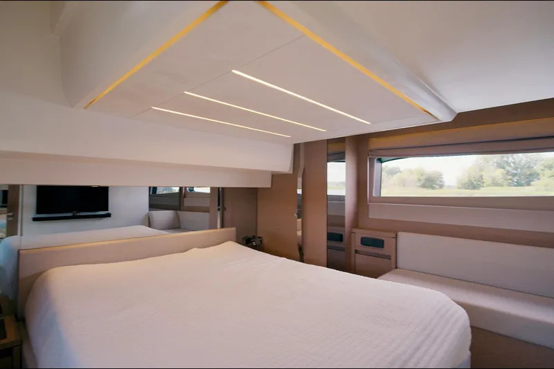 Prestige 520s Yacht Photos Pics Luxurious interior of 2018 Prestige 520S yacht with modern bedroom design.