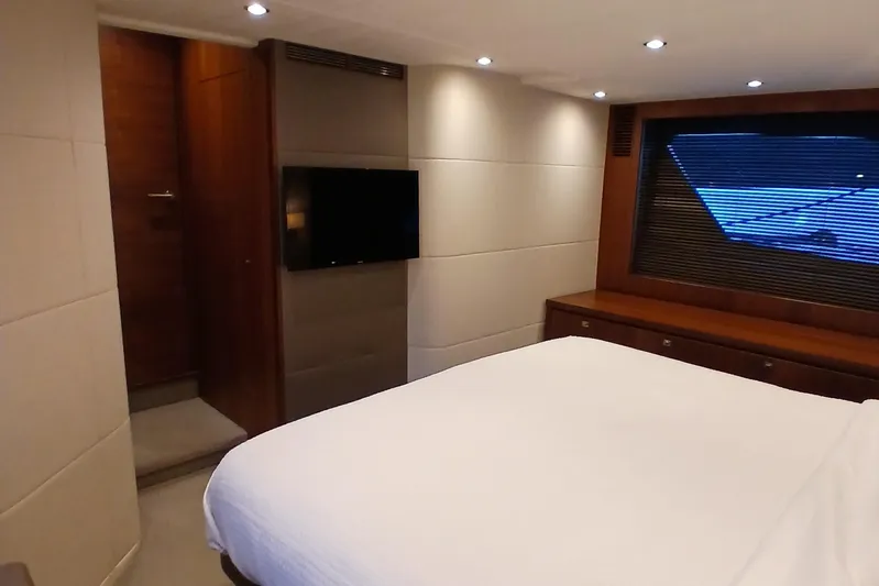  Yacht Photos Pics Luxurious cabin interior of 2015 Princess V62-S yacht with modern amenities.