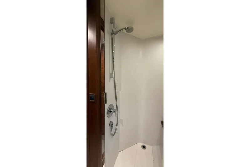  Yacht Photos Pics Shower area in 2015 Princess V62-S yacht, featuring sleek design and modern fixtures.