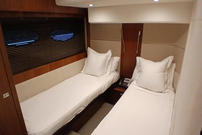  Yacht Photos Pics Luxurious twin cabin interior of 2015 Princess V62-S yacht.