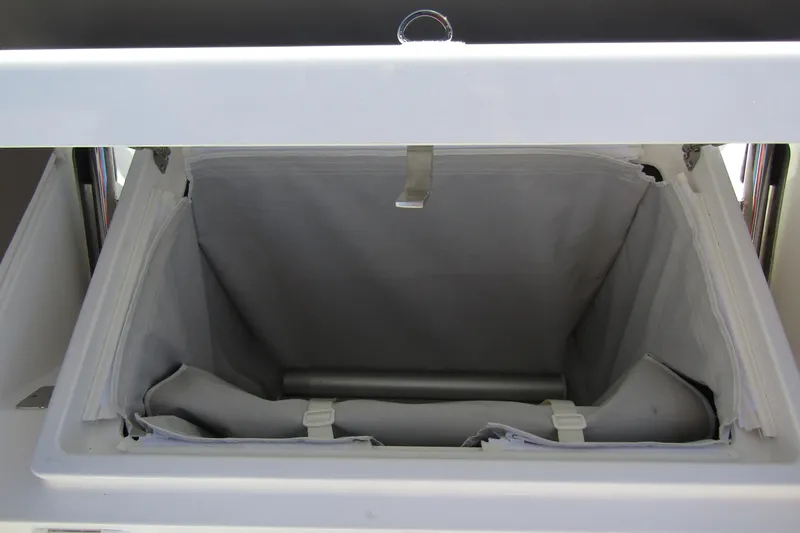  Yacht Photos Pics Open storage compartment in a 2025 Nimbus Tender 9 boat.