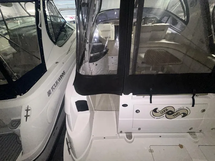  Yacht Photos Pics 2008 Four Winns V358 boats docked side by side in a marina.