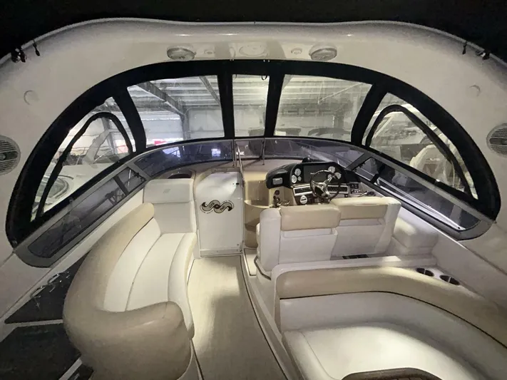  Yacht Photos Pics 2008 Four Winns V358 boat interior with plush seating and modern dashboard.