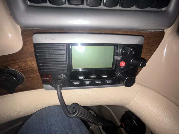  Yacht Photos Pics VHF radio on 2008 Four Winns V358 boat dashboard, featuring control knobs and display.