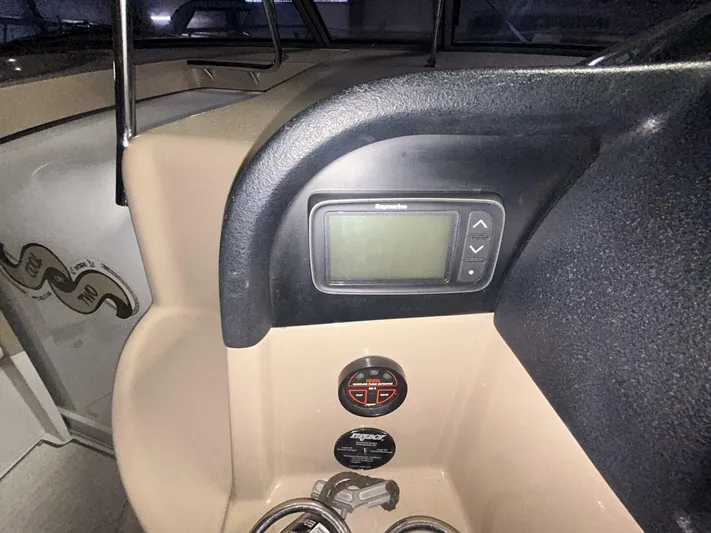  Yacht Photos Pics Control panel of a 2008 Four Winns V358 boat, featuring a digital display and controls.