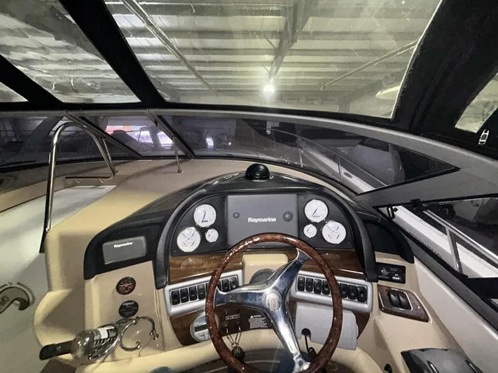  Yacht Photos Pics 2008 Four Winns V358 boat dashboard with steering wheel and navigation instruments.