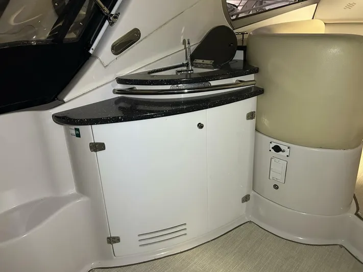  Yacht Photos Pics 2008 Four Winns V358 yacht interior with sleek kitchenette and modern design.