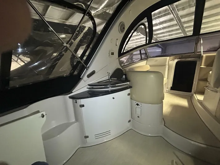  Yacht Photos Pics 2008 Four Winns V358 yacht interior with seating and kitchenette area.