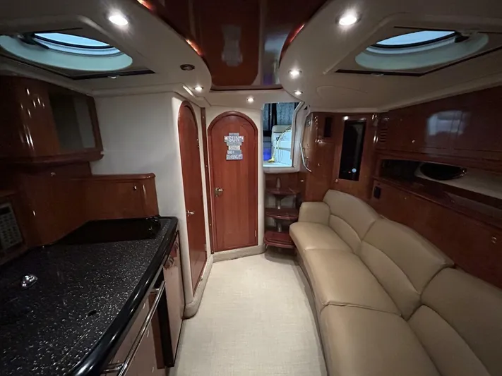  Yacht Photos Pics Luxurious interior of 2008 Four Winns V358 yacht with leather seating and modern amenities.