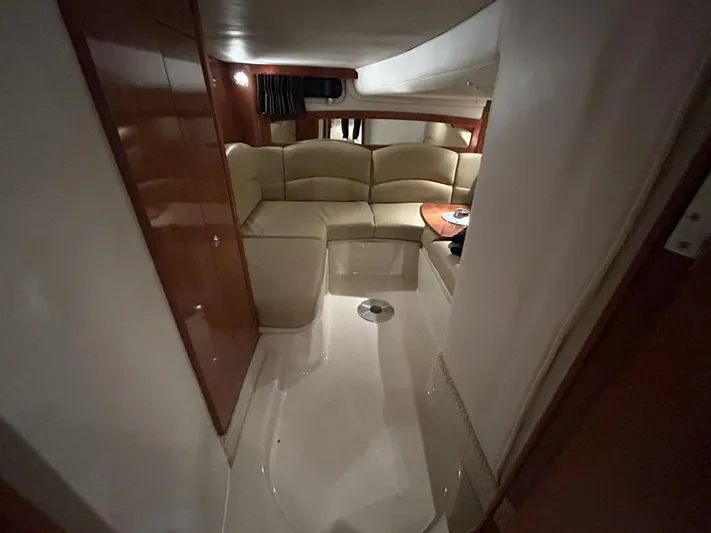  Yacht Photos Pics 2008 Four Winns V358 interior with beige seating and wooden accents.