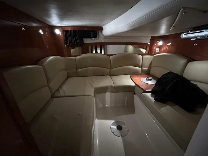  Yacht Photos Pics Luxurious interior of 2008 Four Winns V358 yacht with plush seating and wooden accents.
