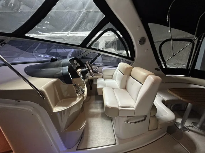  Yacht Photos Pics 2008 Four Winns V358 yacht interior with plush seating and modern dashboard.