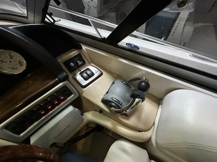  Yacht Photos Pics 2008 Four Winns V358 boat cockpit with steering wheel, controls, and Garmin system.